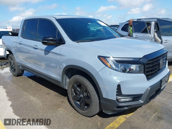 2023 Honda Ridgeline Black Edition z VIN 5FPYK3F83PB022931, wystawiony jako IAAI lot #42105410 z przebiegiem 42 807 mil mil oraz . Historia ofert i sprzedaży dostępna na DreamBid. Obrazek 1.