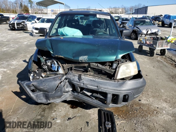1999 Honda CR-V LX with VIN JHLRD184XXC083344, listed as a Copart auction lot 86395264 with 165,141 mi miles and Salvage Title. Bid and sale history available at carsss.com. Image 5.