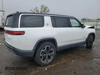 2023 Rivian R1S Adventure z VIN 7PDSGBBA2PN026420, wystawiony jako Copart lot #55331045 z przebiegiem 29 938 mil mil oraz Szkoda całkowita • Salvage title. Historia ofert i sprzedaży dostępna na DreamBid. Obrazek 3.