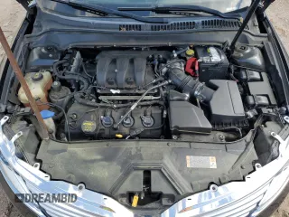 2013 Lincoln MKZ z VIN 3LN6L2GK5DR823755, wystawiony jako Copart lot #53060295 z przebiegiem 145 624 mil mil oraz Szkoda całkowita • Salvage title. Historia ofert i sprzedaży dostępna na DreamBid. Obrazek 12.