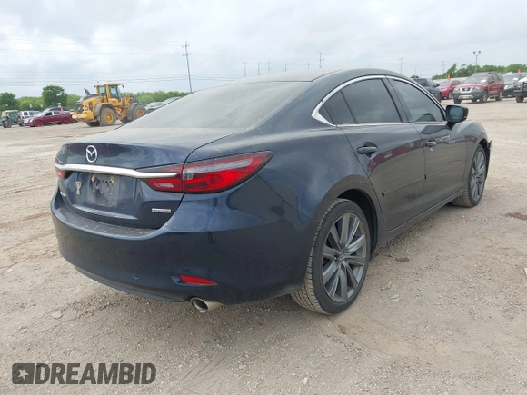 2019 Mazda 6 Touring with VIN JM1GL1VM7K1507773, listed as a IAAI auction lot 42085213 with 59,589 mi miles and . Bid and sale history available at carsss.com. Image 4.