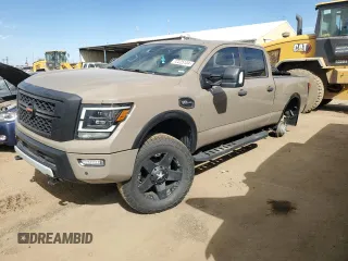 2021 Nissan Titan SV z VIN 1N6AA1FB5MN507160, wystawiony jako Copart lot #72225134 z przebiegiem 100 987 mil mil oraz Szkoda całkowita • Salvage title. Historia ofert i sprzedaży dostępna na DreamBid. Obrazek 1.