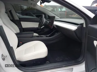 2020 Tesla Model 3 Long Range with VIN 5YJ3E1EB0LF703733, listed as a IAAI auction lot 41796732 with 75,027 mi miles. Bid and sale history available at carsss.com. Image 5.