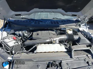 2023 Ford F-150 XL with VIN 1FTEW1C80PKE77571, listed as a IAAI auction lot 41648122 with 49,196 mi miles and . Bid and sale history available at DreamBid. Image 10.