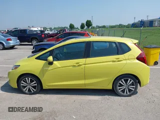 2015 Honda Fit EX-L z VIN 3HGGK5H84FM717976, wystawiony jako IAAI lot #42451573 z przebiegiem 110 963 mil mil oraz . Historia ofert i sprzedaży dostępna na DreamBid. Obrazek 14.