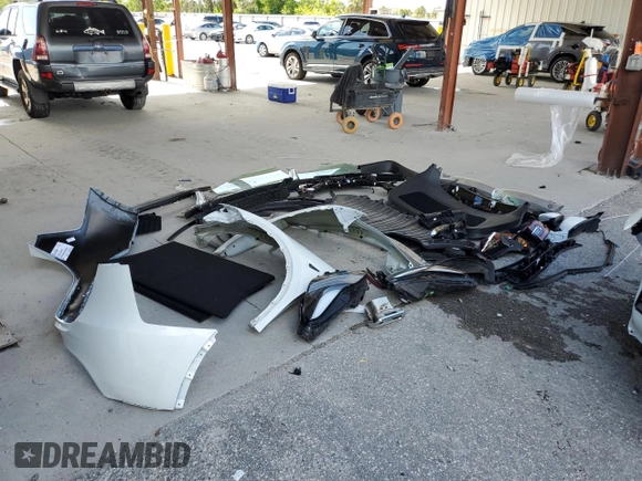 2024 Tesla Model Y Long Range with VIN 7SAYGDEEXRA288960, listed as a Copart auction lot 60801525 with 18,942 mi miles and Salvage title. Bid and sale history available at DreamBid. Image 13.