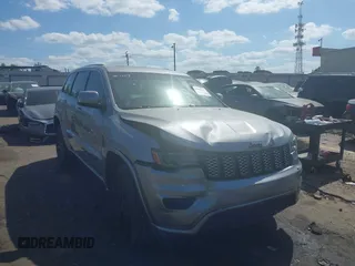 2020 Jeep Grand Cherokee Laredo with VIN 1C4RJFAG4LC316197, listed as a IAAI auction lot 42080502 with 76,753 mi miles and . Bid and sale history available at DreamBid. Image 1.