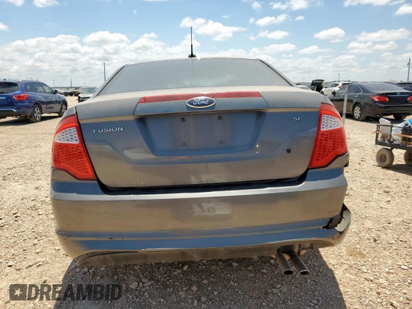 2012 Ford Fusion SE with VIN 3FAHP0HA9CR435931, listed as a Copart auction lot 61633525 with 169,561 mi miles and Salvage title. Bid and sale history available at DreamBid. Image 6.