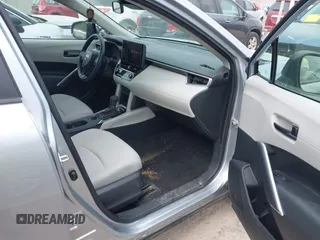 2023 Toyota Corolla Cross L with VIN 7MUAAABG9PV047493, listed as a IAAI auction lot 42441413 with 15,485 mi miles and . Bid and sale history available at DreamBid. Image 5.