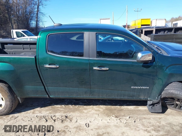 2015 GMC Canyon 4WD SLT with VIN 1GTG6CE35F1273343, listed as a IAAI auction lot 41683758 with 77,911 mi miles. Bid and sale history available at carsss.com. Image 13.