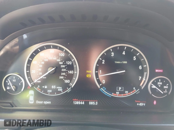 2013 BMW 5 Series 535i xDrive with VIN WBAFU7C50DDU77411, listed as a IAAI auction lot 41796299 with 138,944 mi miles and . Bid and sale history available at carsss.com. Image 7.