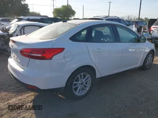 2018 Ford Focus SE z VIN 1FADP3F23JL328462, wystawiony jako IAAI lot #42068209 z przebiegiem 63 194 mil mil oraz . Historia ofert i sprzedaży dostępna na DreamBid. Obrazek 4.