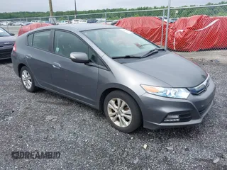 2012 Honda Insight EX z VIN JHMZE2H73CS001396, wystawiony jako IAAI lot #42447394 z przebiegiem 90 894 mil mil oraz . Historia ofert i sprzedaży dostępna na DreamBid. Obrazek 1.