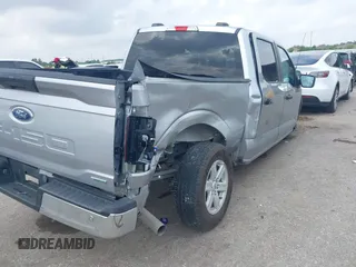 2023 Ford F-150 XL with VIN 1FTEW1C80PFA34183, listed as a IAAI auction lot 42085791 with 60,454 mi miles and . Bid and sale history available at DreamBid. Image 4.