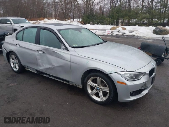 2013 BMW 3 Series 328i xDrive with VIN WBA3B5C58DF594087, listed as a IAAI auction lot 41710362 with 185,994 mi miles. Bid and sale history available at carsss.com. Image 1.