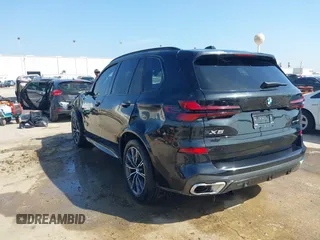 2025 BMW X5 sDrive40i with VIN 5UX13EU02S9Y55556, listed as a IAAI auction lot 41177621 with 272 mi miles. Bid and sale history available at carsss.com. Image 3.