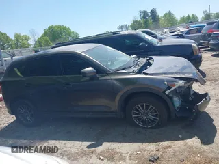 2017 Mazda CX-5 Touring with VIN JM3KFACL5H0197432, listed as a IAAI auction lot 42060117 with 1 mi miles. Bid and sale history available at carsss.com. Image 13.