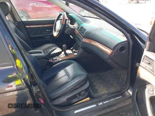2000 BMW 5 Series 528iA with VIN WBADM6344YGU10257, listed as a IAAI auction lot 41773733 with 231,028 mi miles. Bid and sale history available at carsss.com. Image 5.