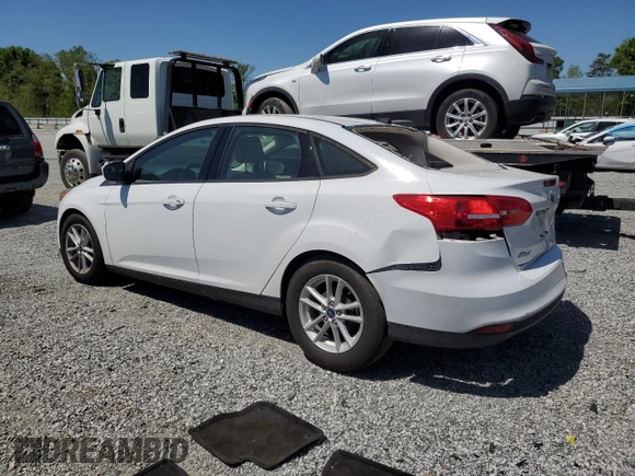 2018 Ford Focus SE z VIN 1FADP3F29JL295712, wystawiony jako Copart lot #53361485 z przebiegiem 55 857 mil mil oraz Szkody całkowita. Historia ofert i sprzedaży dostępna na DreamBid. Obrazek 2.