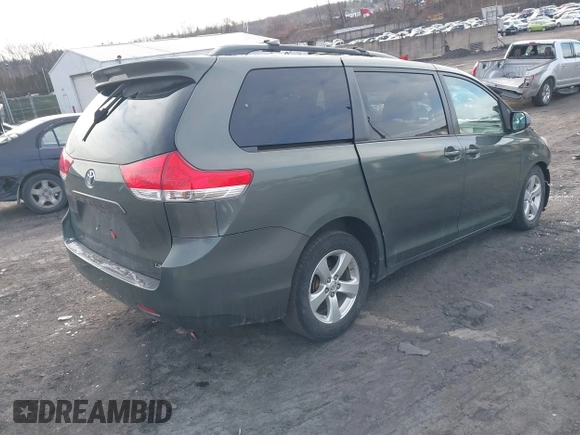 2013 Toyota Sienna LE AAS with VIN 5TDKK3DC9DS334815, listed as a IAAI auction lot 41589497 with 223,674 mi miles and . Bid and sale history available at DreamBid. Image 4.