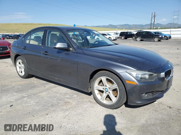 2013 BMW 3 Series 328i xDrive z VIN WBA3B3C5XDF533439, wystawiony jako Copart lot #62130615 z przebiegiem 125 712 mil mil oraz Szkoda całkowita • Salvage title. Historia ofert i sprzedaży dostępna na DreamBid. Obrazek 4.