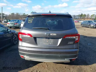 2022 Honda Pilot Touring 7-Passenger with VIN 5FNYF6H62NB010647, listed as a IAAI auction lot 41199560 with 102,066 mi miles. Bid and sale history available at carsss.com. Image 16.