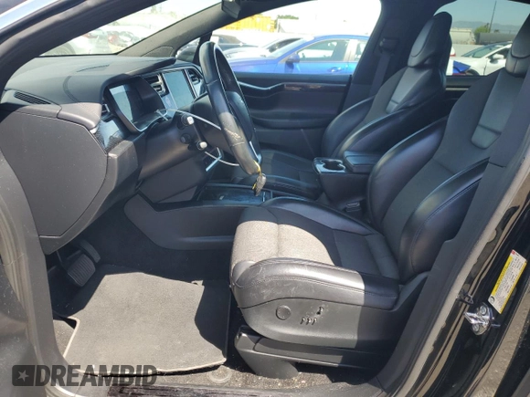 2017 Tesla Model X 90D with VIN 5YJXCBE20HF051099, listed as a Copart auction lot 52208205 with 118,828 mi miles and Salvage Title. Bid and sale history available at DreamBid. Image 7.