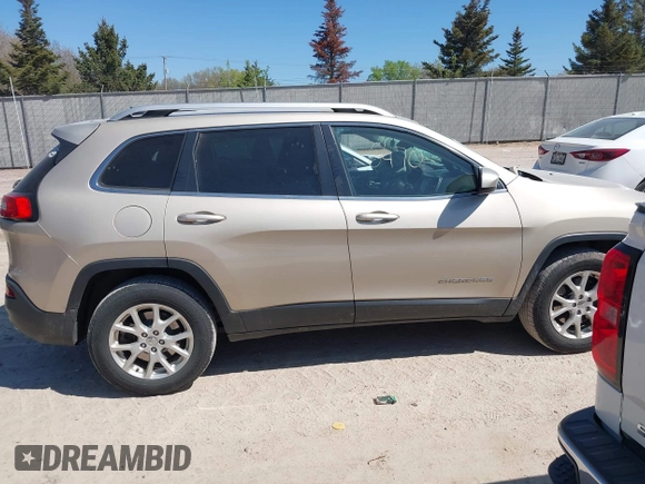 2014 Jeep Cherokee Latitude z VIN 1C4PJMCS3EW197492, wystawiony jako IAAI lot #42216470 z przebiegiem 125 156 mil mil oraz . Historia ofert i sprzedaży dostępna na DreamBid. Obrazek 13.