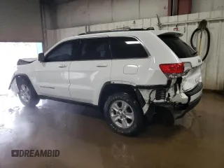 2014 Jeep Grand Cherokee Laredo with VIN 1C4RJFAG2EC132895, listed as a Copart auction lot 49311855 with 147,289 mi miles and Salvage Title. Bid and sale history available at DreamBid. Image 2.