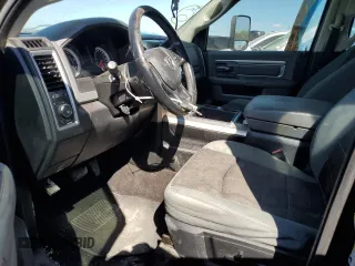 2014 Ram 2500 SLT with VIN 3C6UR5DL9EG145475, listed as a Copart auction lot 68456504 with 210,277 mi miles and Salvage title. Bid and sale history available at DreamBid. Image 7.