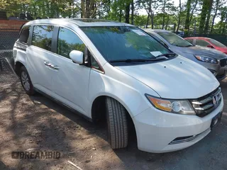 2014 Honda Odyssey EX-L with VIN 5FNRL5H63EB064854, listed as a IAAI auction lot 42102704 with 148,536 mi miles and . Bid and sale history available at carsss.com. Image 1.
