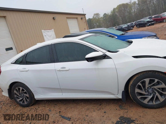 2018 Honda Civic EX with VIN 2HGFC2F77JH576099, listed as a IAAI auction lot 41924628 with 100,998 mi miles and . Bid and sale history available at DreamBid. Image 13.