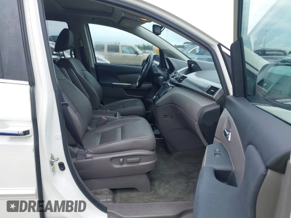 2016 Honda Odyssey EX-L z VIN 5FNRL5H61GB030771, wystawiony jako IAAI lot #42459561 z przebiegiem 130 541 mil mil oraz . Historia ofert i sprzedaży dostępna na DreamBid. Obrazek 5.