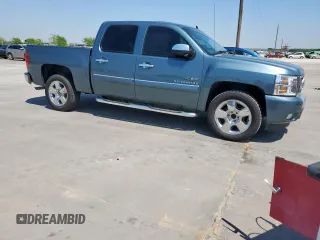 2011 Chevrolet Silverado 1500 LT with VIN 3GCPCSE00BG146195, listed as a Copart auction lot 52179255 with 142,685 mi miles and Salvage Title. Bid and sale history available at DreamBid. Image 4.