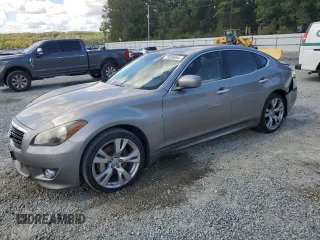 2011 Infiniti M with VIN JN1BY1AP9BM322203, listed as a Copart auction lot 73536594 with 253,376 mi miles and Salvage Title. Bid and sale history available at DreamBid. Image 1.