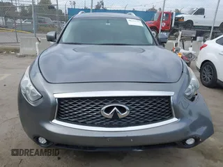 2014 Infiniti QX70 with VIN JN8CS1MU8EM450428, listed as a IAAI auction lot 42233727 with 88,342 mi miles and . Bid and sale history available at DreamBid. Image 12.