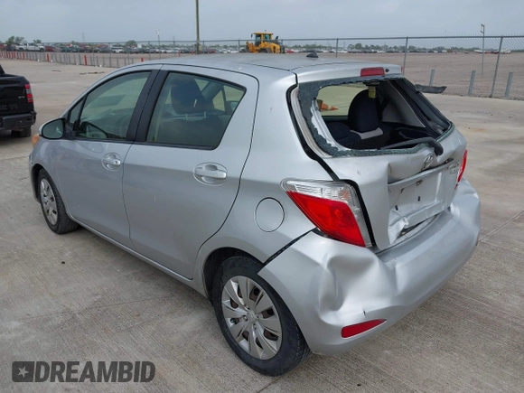 2013 Toyota Yaris L with VIN JTDKTUD32DD542761, listed as a IAAI auction lot 41969533 with 123,281 mi miles. Bid and sale history available at carsss.com. Image 3.
