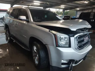2015 GMC Yukon SLT z VIN 1GKS1BKC8FR518374, wystawiony jako IAAI lot #41841592 z przebiegiem 146 349 mil mil oraz . Historia ofert i sprzedaży dostępna na DreamBid. Obrazek 1.