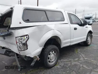 2018 Ford F-150 XL with VIN 1FTMF1CBXJKC83791, listed as a IAAI auction lot 41796119 with 196,611 mi miles. Bid and sale history available at carsss.com. Image 4.