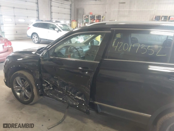 2020 Volkswagen Tiguan SE with VIN 3VV2B7AX4LM115131, listed as a IAAI auction lot 42017352 with 87,909 mi miles. Bid and sale history available at carsss.com. Image 6.