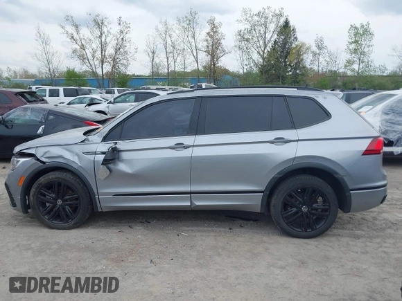 2022 Volkswagen Tiguan SE R-Line Black с VIN 3VVCB7AX1NM065960, выставлен на аукционе IAAI как лот 42149626 с пробегом 71 698 миль миль и . История ставок и продаж доступна на DreamBid. Изображение 14.