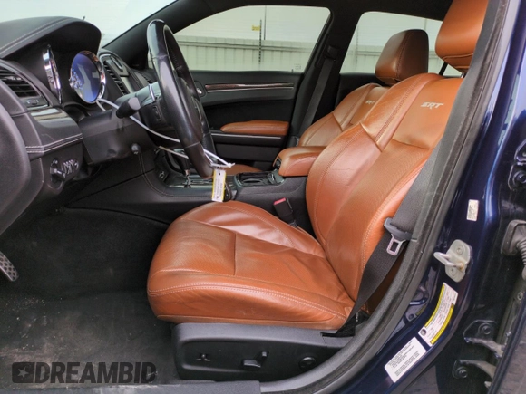 2013 Chrysler 300 SRT-8 z VIN 2C3CCAFJ4DH735421, wystawiony jako Copart lot #50936775 z przebiegiem 113 701 mil mil oraz Szkoda całkowita • Salvage title. Historia ofert i sprzedaży dostępna na DreamBid. Obrazek 7.