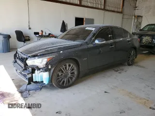 2016 Infiniti Q50 Red Sport 400 с VIN JN1FV7AR8GM450745, выставлен на аукционе Copart как лот 54018795 с пробегом 116 758 миль миль и Списание • Salvage title. История ставок и продаж доступна на DreamBid. Изображение 1.