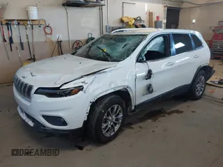 2020 Jeep Cherokee Altitude with VIN 1C4PJMLN6LD647106, listed as a IAAI auction lot 41406440 with 58,788 mi miles. Bid and sale history available at carsss.com. Image 2.
