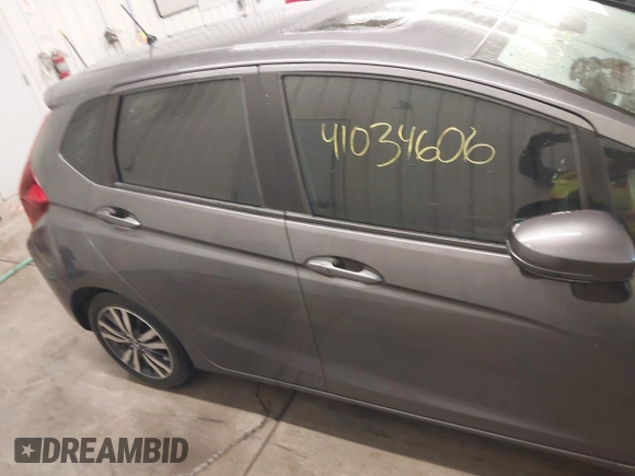 2015 Honda Fit EX-L with VIN 3HGGK5H85FM755006, listed as a IAAI auction lot 41034606 with 97,294 mi miles and . Bid and sale history available at DreamBid. Image 13.
