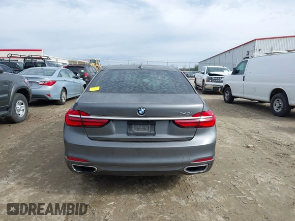 2017 BMW 7 Series 740i with VIN WBA7E2C54HG740170, listed as a IAAI auction lot 41432578 with 110,893 mi miles and . Bid and sale history available at DreamBid. Image 16.