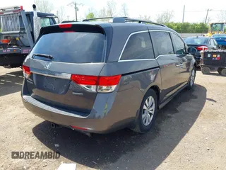 2016 Honda Odyssey SE with VIN 5FNRL5H34GB043343, listed as a IAAI auction lot 42096360 with 140,878 mi miles and . Bid and sale history available at DreamBid. Image 4.