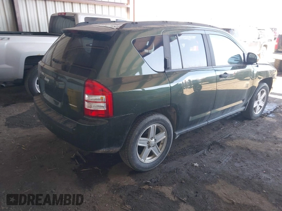 2007 Jeep Compass Sport with VIN 1J8FF47WX7D211695, listed as a IAAI auction lot 41839810 with 72,582 mi miles. Bid and sale history available at carsss.com. Image 4.