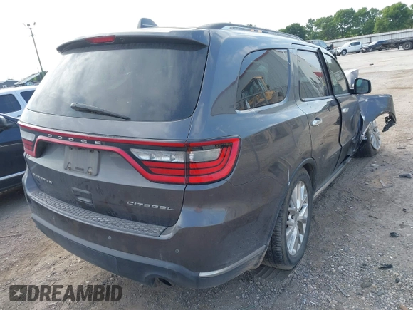 2014 Dodge Durango Citadel with VIN 1C4RDHEG2EC381324, listed as a IAAI auction lot 42021611 with 104,178 mi miles and . Bid and sale history available at DreamBid. Image 4.