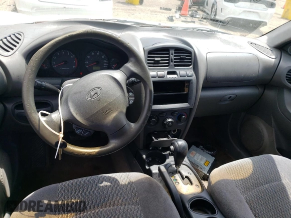 2004 Hyundai Santa Fe z VIN KM8SB12B04U640985, wystawiony jako Copart lot #56584595 z przebiegiem 239 527 mil mil oraz Szkoda całkowita • Salvage title. Historia ofert i sprzedaży dostępna na DreamBid. Obrazek 8.